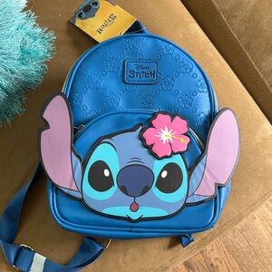 Disney Blue Mini Backpack with Pink Flower Accent